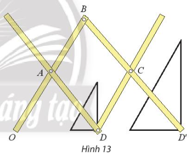 Tìm các tỉ số vị tự của phép biến hình được thực hiện trên cây thước vẽ truyền trong Hình 13.